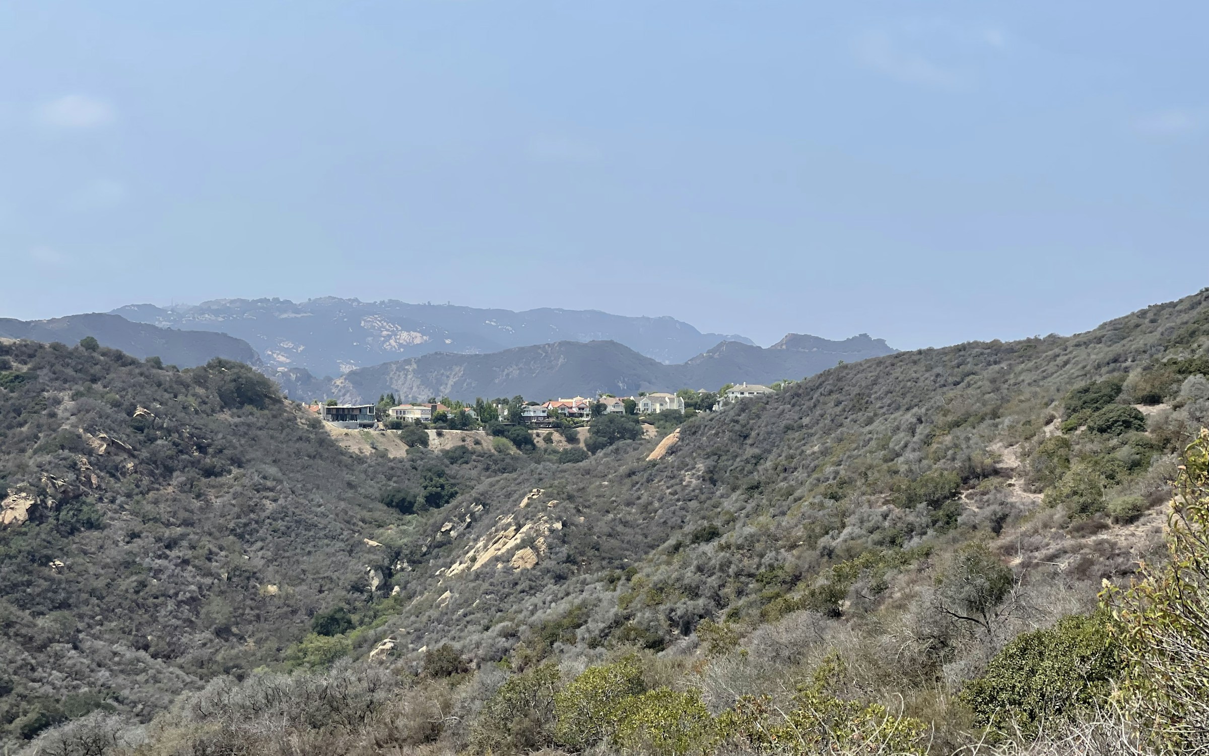 Illustrative view of estate homes along a Calabasas ridge